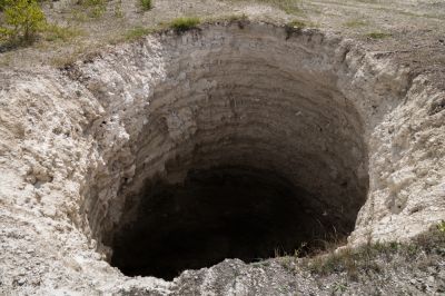 Repairing sinkholes eliminates hazardous ground conditions that could lead to injury or accidents, especially around homes and public spaces.